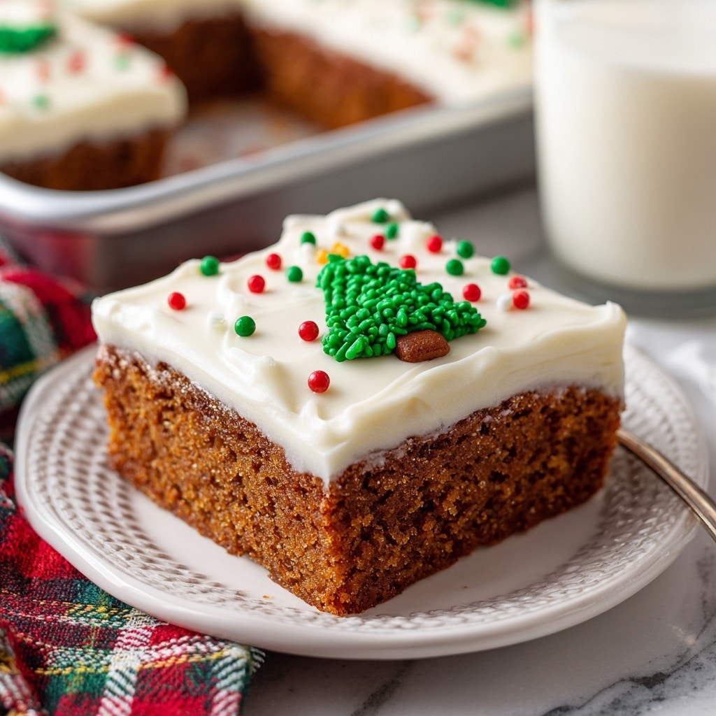 A close-up of a square slice of brown cake topped with a thick white frosting layer decorated with small green, red, and white round sprinkles and a green and red Christmas tree sprinkle in the center. The cake has one thick bottom layer of moist-looking brown cake and one thick top layer of smooth white frosting. This slice is placed on a white plate with a textured edge, sitting on a white marbled surface. In the background, a glass of milk is visible next to a rectangular baking pan filled with more cake, and a colorful plaid cloth adds a festive touch. Photo taken with an iphone --ar 4:5 --v 7