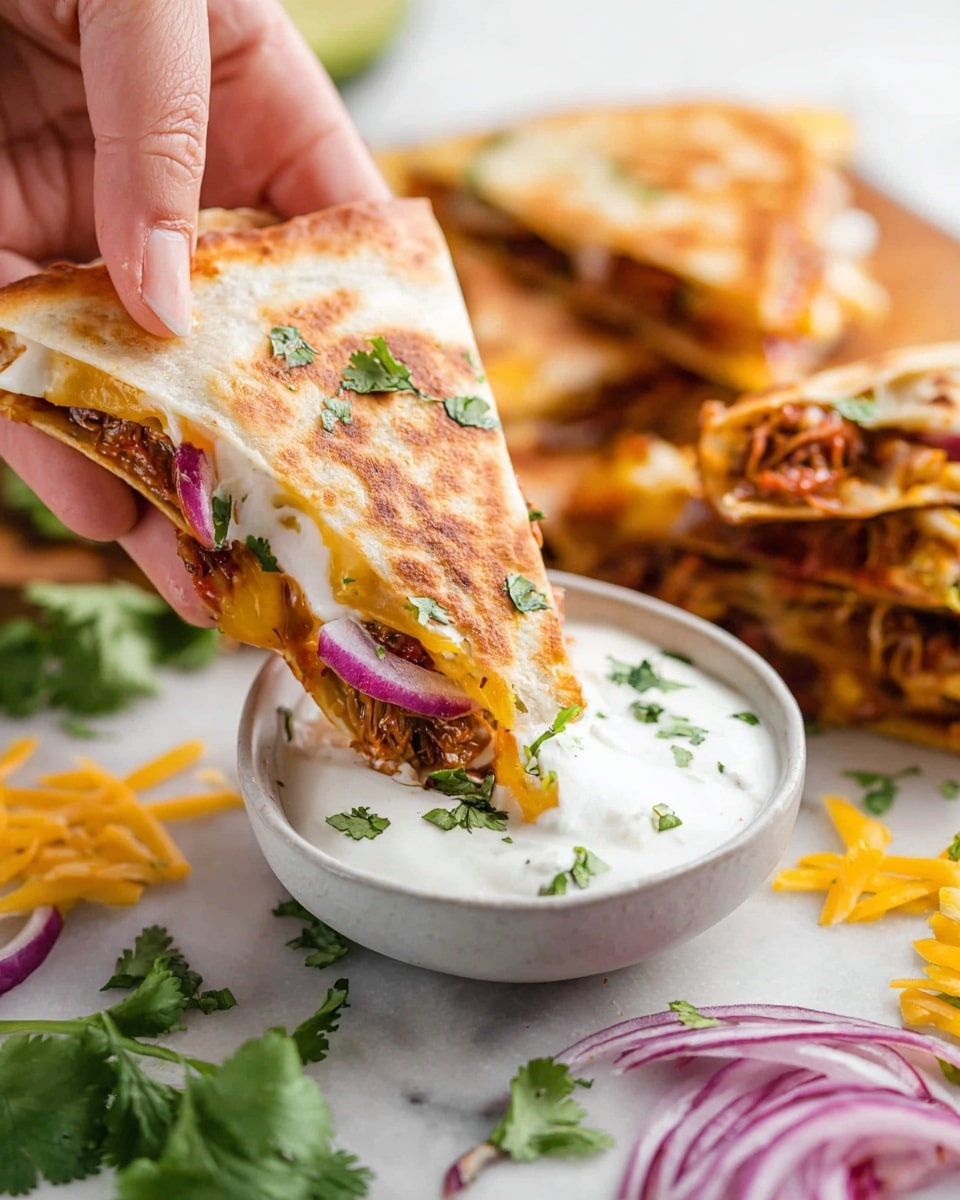 The image shows several golden brown quesadilla slices, each folded into a triangle with slightly crisp edges. The filling inside is visible in some parts and includes bright orange melted cheese, thin strands of shredded meat, sliced red onions, and small pieces of green herbs. The quesadillas are arranged closely on a sheet of parchment paper, with fresh green cilantro leaves scattered around them. Two small white bowls are placed near the quesadillas; one holds a smooth dark reddish-brown sauce, and the other contains a white creamy sauce sprinkled with chopped green herbs. There is also a small glass bowl with sliced red onions on the side. The background has a white marbled texture. photo taken with an iphone --ar 4:5 --v 7