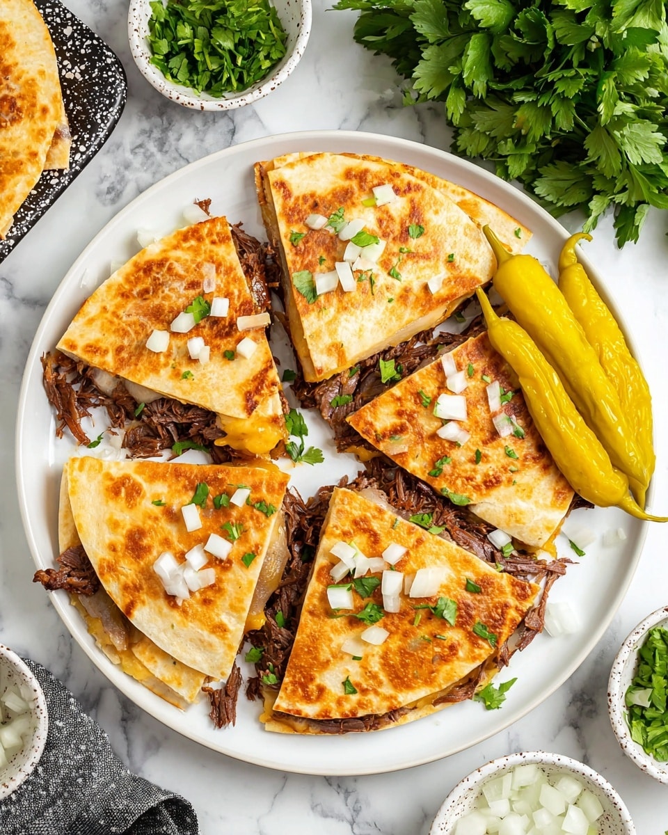 The image shows a white plate full of folded quesadillas, each cut into triangle shapes. The outer layer of the quesadillas is golden and slightly crispy with a soft texture visible along the edges. Inside, there is a thick layer of shredded dark brown beef and melted white cheese peeking out. The quesadillas are sprinkled with small white onion pieces and fresh green cilantro leaves. At the back of the plate, there are two whole yellow-green pepperoncini peppers. The plate is placed on a white marbled surface. Photo taken with an iphone --ar 4:5 --v 7